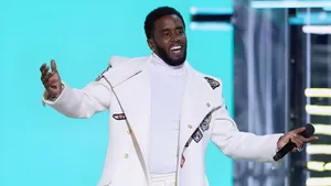 Diddy Performing On Stage Wallpaper