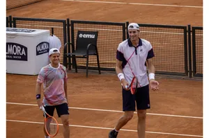 Diego Schwartzman And John Isner Wallpaper