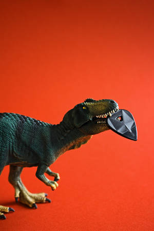 Dinosaur Figure Side View Wallpaper