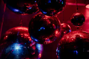 Disco Ball Glow Party Scene Wallpaper