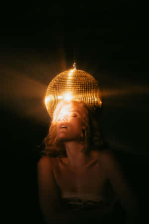 Disco Inspired Portraitwith Mirror Ball Hat Wallpaper