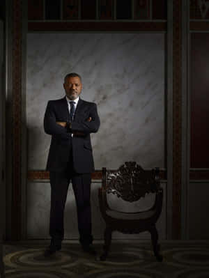 Distinguished Man Standing Marble Backdrop Wallpaper