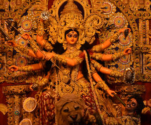 Divine Goddess Kali Exuding Power And Energy Wallpaper