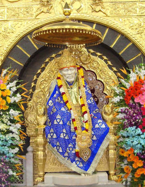 Divine Sai Baba In Golden Aura 4k Image Wallpaper