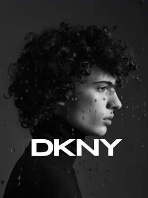 Dkny Logo With Model Wallpaper