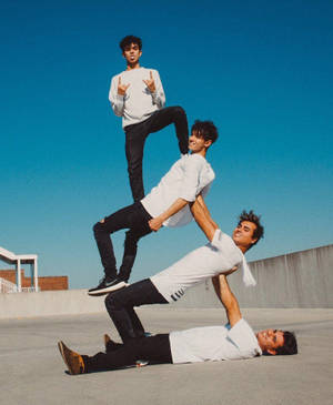 Dobre Brothers In White Tees Wallpaper