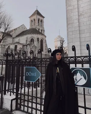 Domelipa In Black Winter Outfit Wallpaper