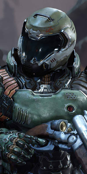 Doom - A Character In A Green Suit Holding A Gun Wallpaper