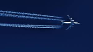 Double Lines White Trails Of Airplane 4k Wallpaper