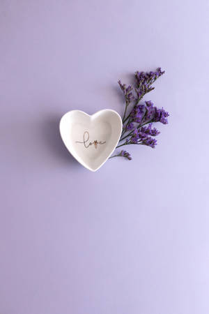 Download Heart Shaped Bowl With Flower On Purple Background Free Stock Photo Wallpaper