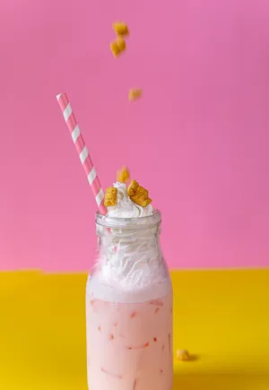 Milkshake with whipped cream and pink splash. 3d rendering generative ai  22255566 Stock Photo at Vecteezy