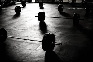 Dramatic Barbells Silhouettes Wallpaper