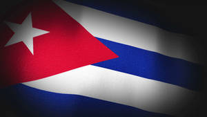 Dramatic Cuban Flag Illuminated Against A Dark Background Wallpaper