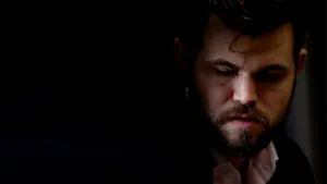 Dramatic Magnus Carlsen Portrait Wallpaper