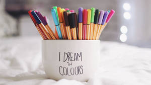 Dream In Colours Mug And Pens Wallpaper