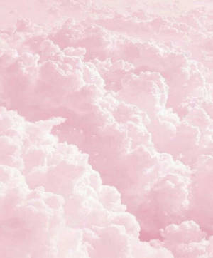 Dreamy Pastel Ipad Wallpaper With Thick Pink Clouds Wallpaper