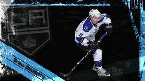 Drew Doughty With Name And Los Angeles Kings Logo In Faded Effect Wallpaper