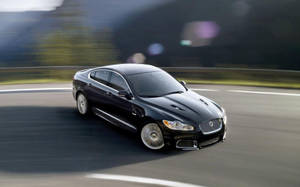 Drifting Black Jaguar Car Wallpaper