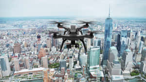 Drone Over City Skyline Wallpaper