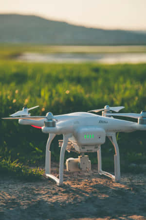 Drone Readyfor Takeoffat Sunset Wallpaper