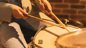 Drummer Playing Snare Drum Wallpaper