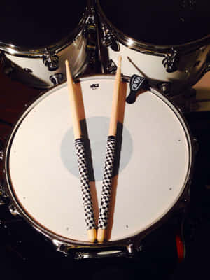 Drumstickson Snare Drum Wallpaper