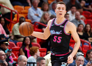 Duncan Robinson In Colorful Black Jersey Wallpaper