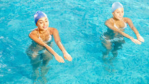 Duo In Artistic Swimming Competition Wallpaper