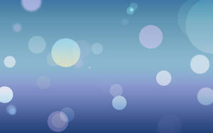 Dynamic Pastel Blue Bubbles Wallpaper