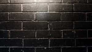 Dynamic Sunrise Over The Rocky Beach Wallpaper