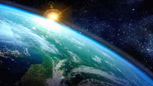 Earth From Space With Sun Shining On It Wallpaper