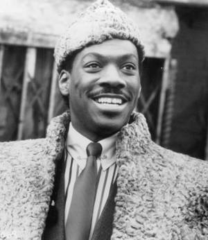 Eddie Murphy In His Iconic Role From 'coming To America'. Wallpaper