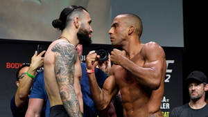 Edson Barboza And Shane Burgos Face-off Wallpaper