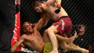 Edson Barboza Subdued By Khabib Nurmagomedov Wallpaper