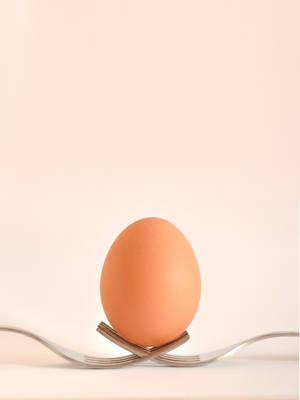 Eggs On Peach Background Wallpaper