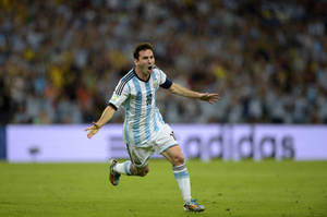 Elated Lionel Messi Running Wallpaper