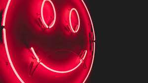 Electrifying Neon Smile Against The Night Sky Wallpaper