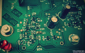 Electronics Circuit Board With Capacitors Wallpaper