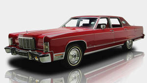 Elegance In Motion: 1976 Lincoln Continental Luxury Car Wallpaper
