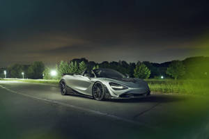 Elegance In Motion: Mclaren 720s Luxury Supercar Wallpaper