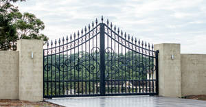 Elegant Black Ornamental Iron Gate Wallpaper