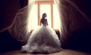 Elegant Bride In Stunning Wedding Gown Wallpaper
