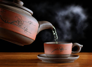 Elegant Hot Tea Pot Brewing Tranquility Wallpaper