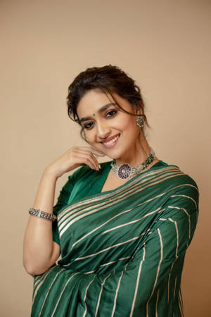 Elegant Keerthi Suresh In A Traditional Green Saree Wallpaper