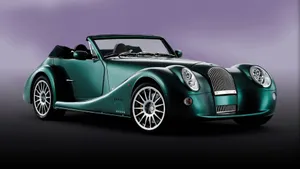 Elegant Morgan Car On City Street Wallpaper