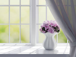 Elegant Purple Flowers In A Timeless Ceramic Vase Wallpaper