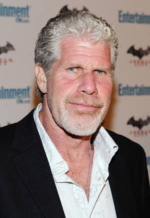 Elegant Ron Perlman In A Stylish Black And White Suit Wallpaper