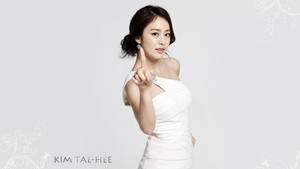Elegant Tae-hee In Asymmetrical Dress Wallpaper