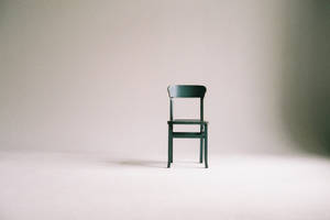 Elegant White Minimalist Wooden Chair Wallpaper