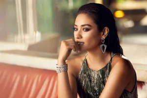Elegant Woman Pensive Look Wallpaper